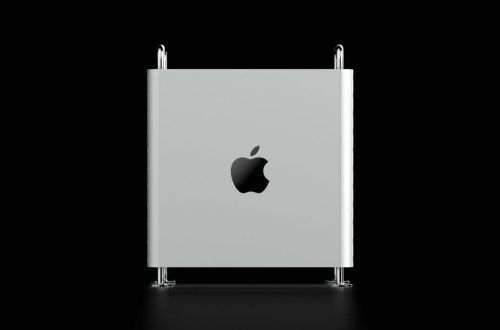 Sleek Apple Mac Pro with iconic minimalist design against a dark background.