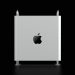Sleek Apple Mac Pro with iconic minimalist design against a dark background.